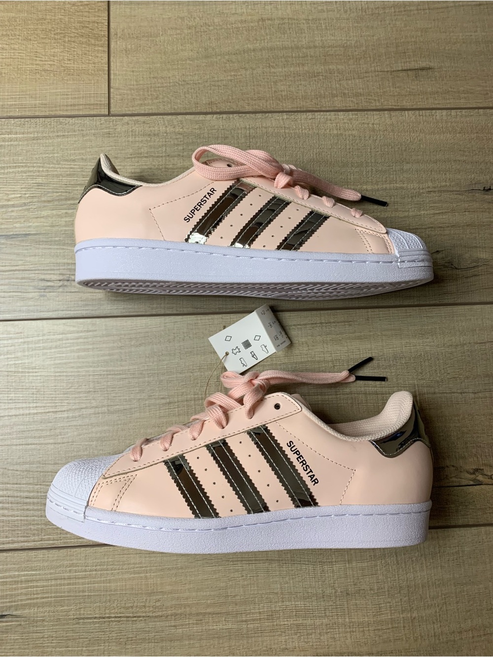 adidas  Superstar Sneakers in Light Pink with Metallic Gold Stripes